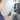 A plumber or technician in a navy shirt holds a handheld diagnostic tool with an antenna in front of an open gas water heater unit on a wall with various pipes and valves.
